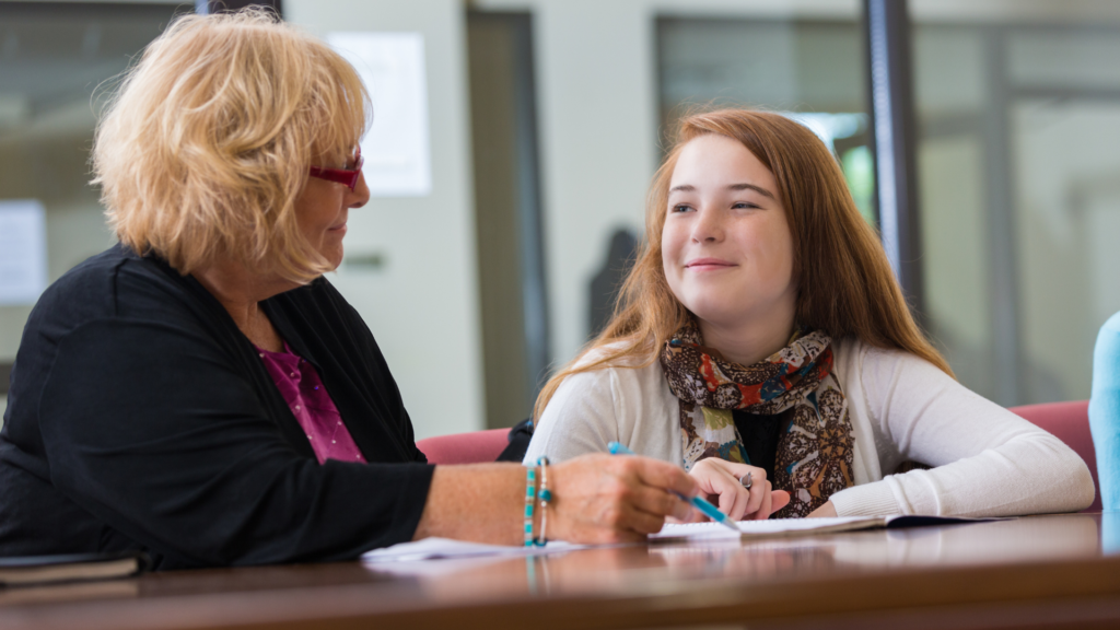 student talking with counselor